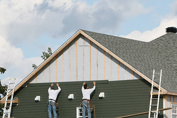 Professional Vinyl Siding technician working in Dayton, IN